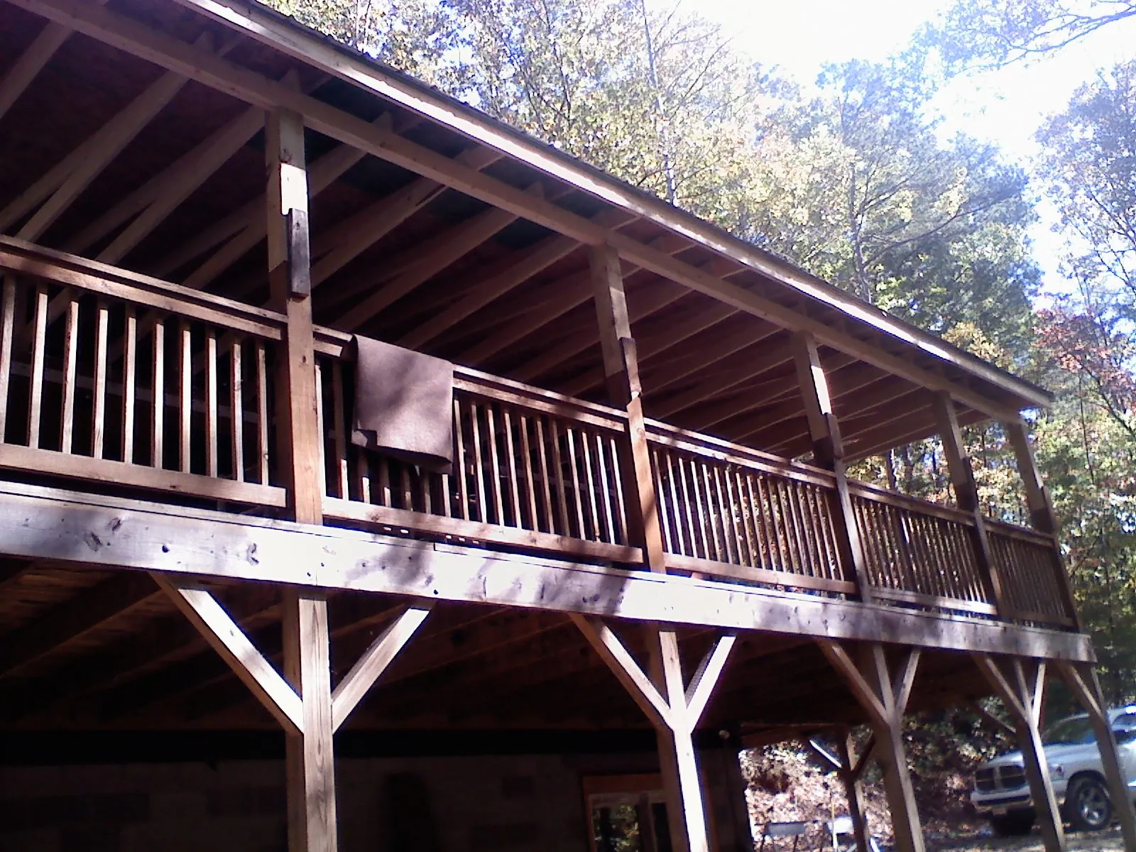Timber framing under a new elevated porch and deck — Roof Leak Repair in Prides Crossing by Roofing Brothers